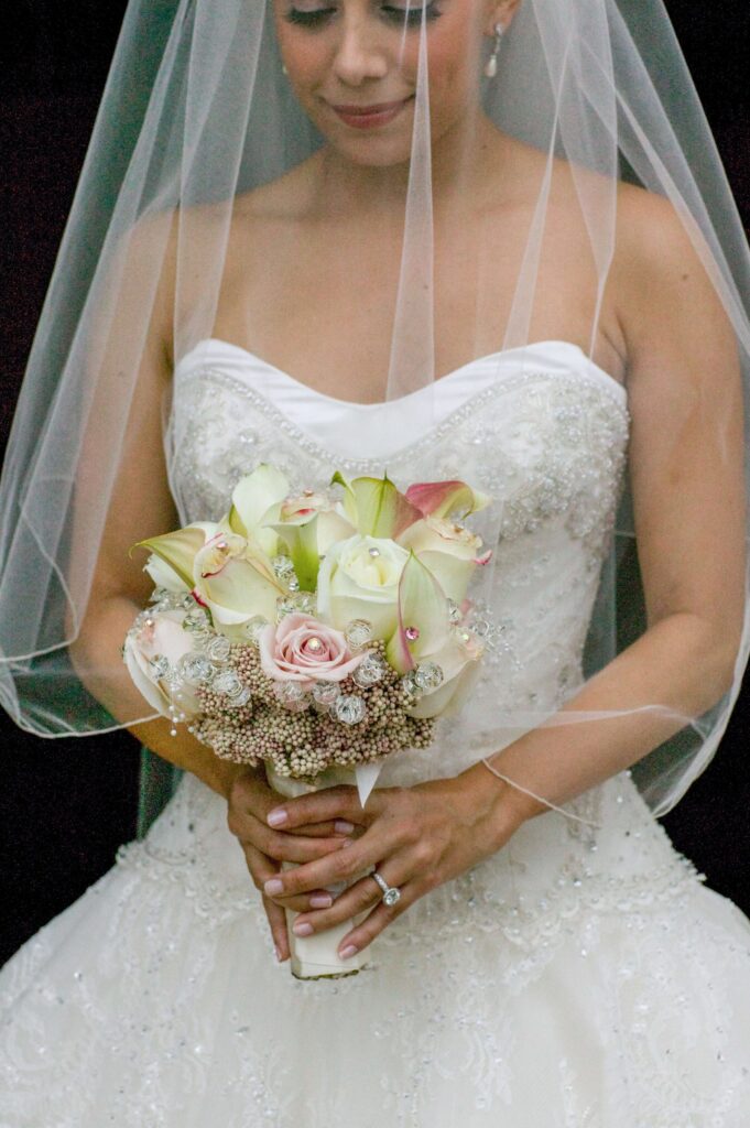bride holding bouquet of flowers