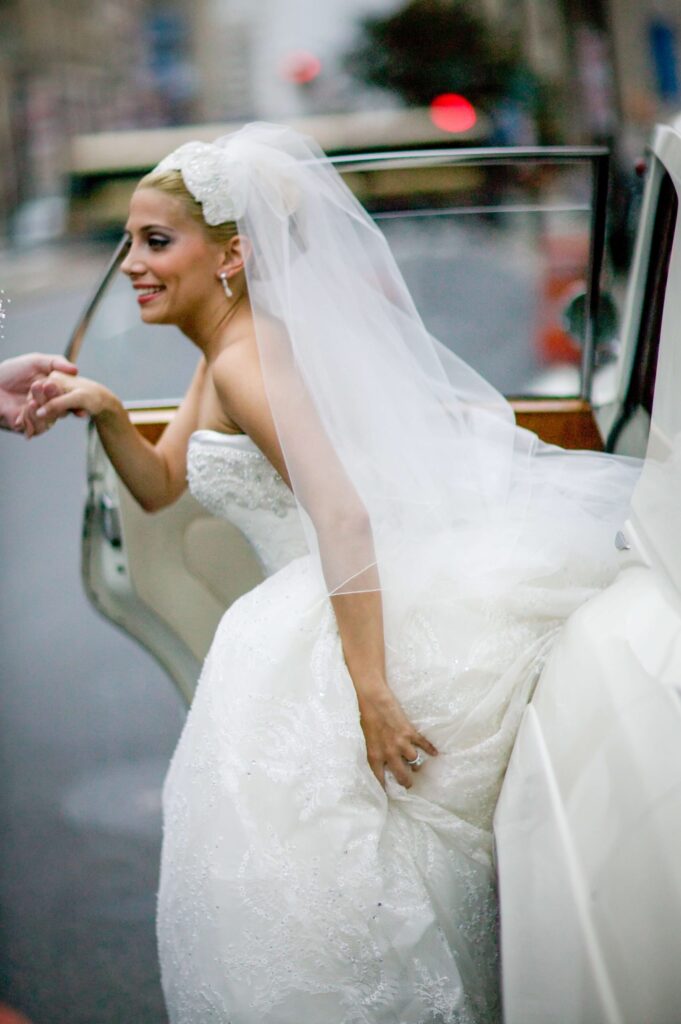 bride getting out of a car