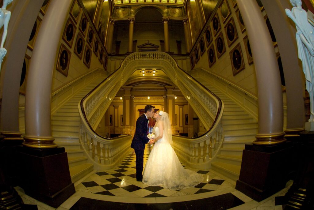 bride and groom kissing in temple