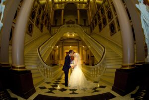bride and groom kissing in temple