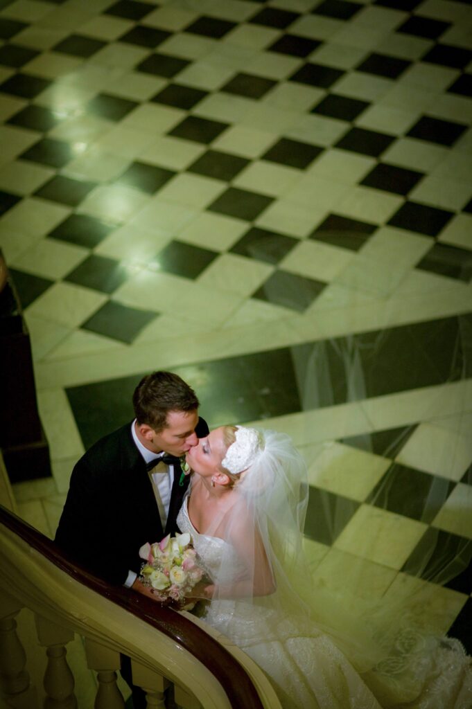 bride and groom kissing each other