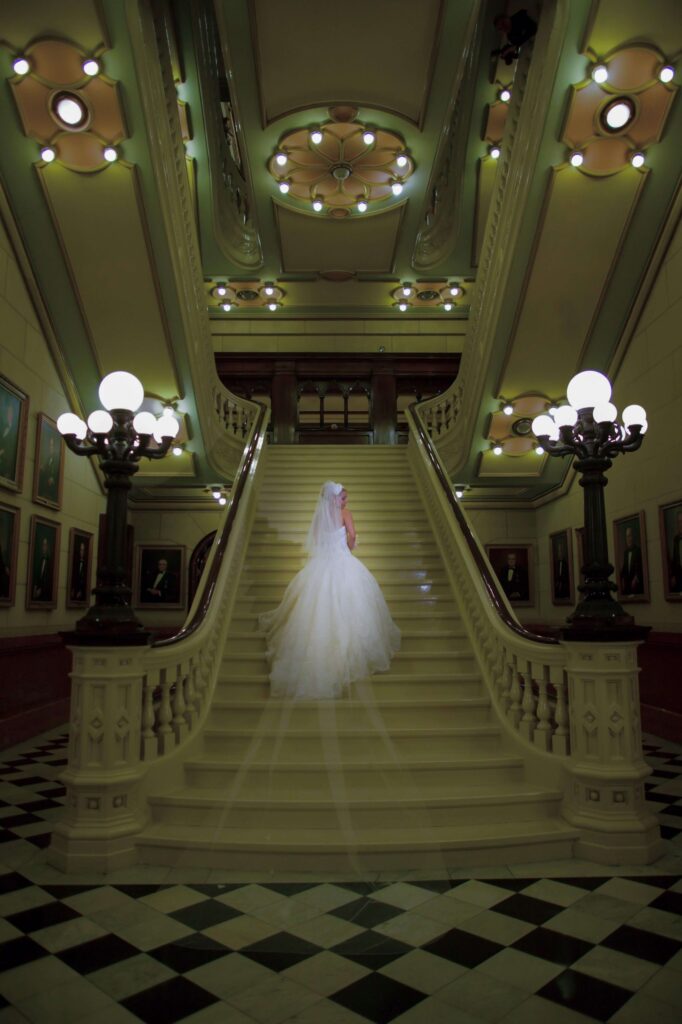 bride walking up a staircase