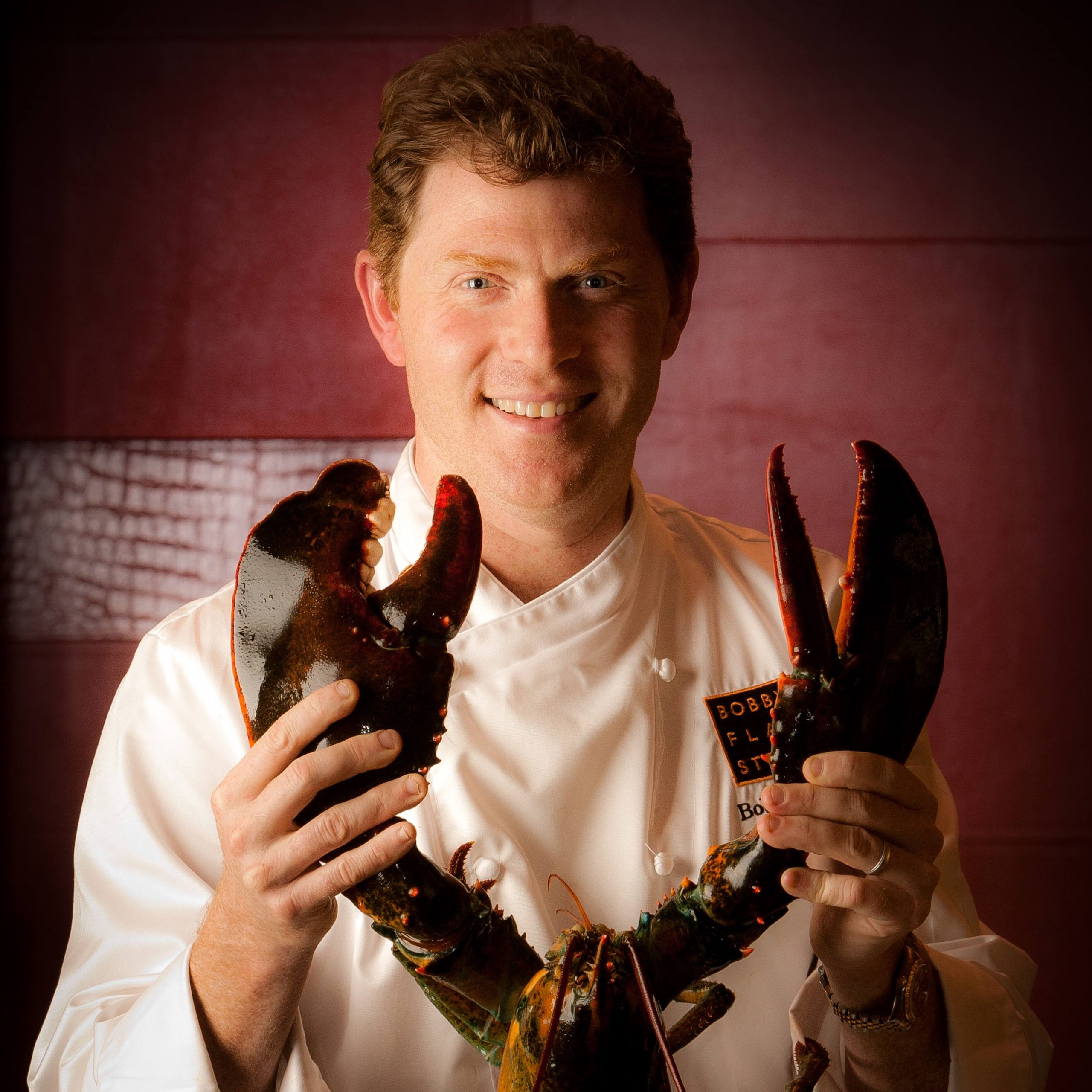 chef bobby flay with lobster