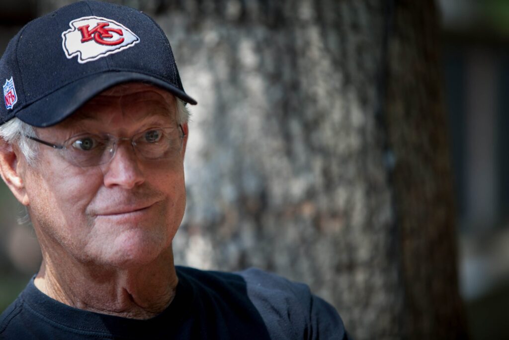 dick vermeil in a chiefs hat getting interviewed