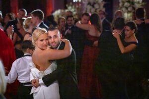 bride and groom slow dance at reception