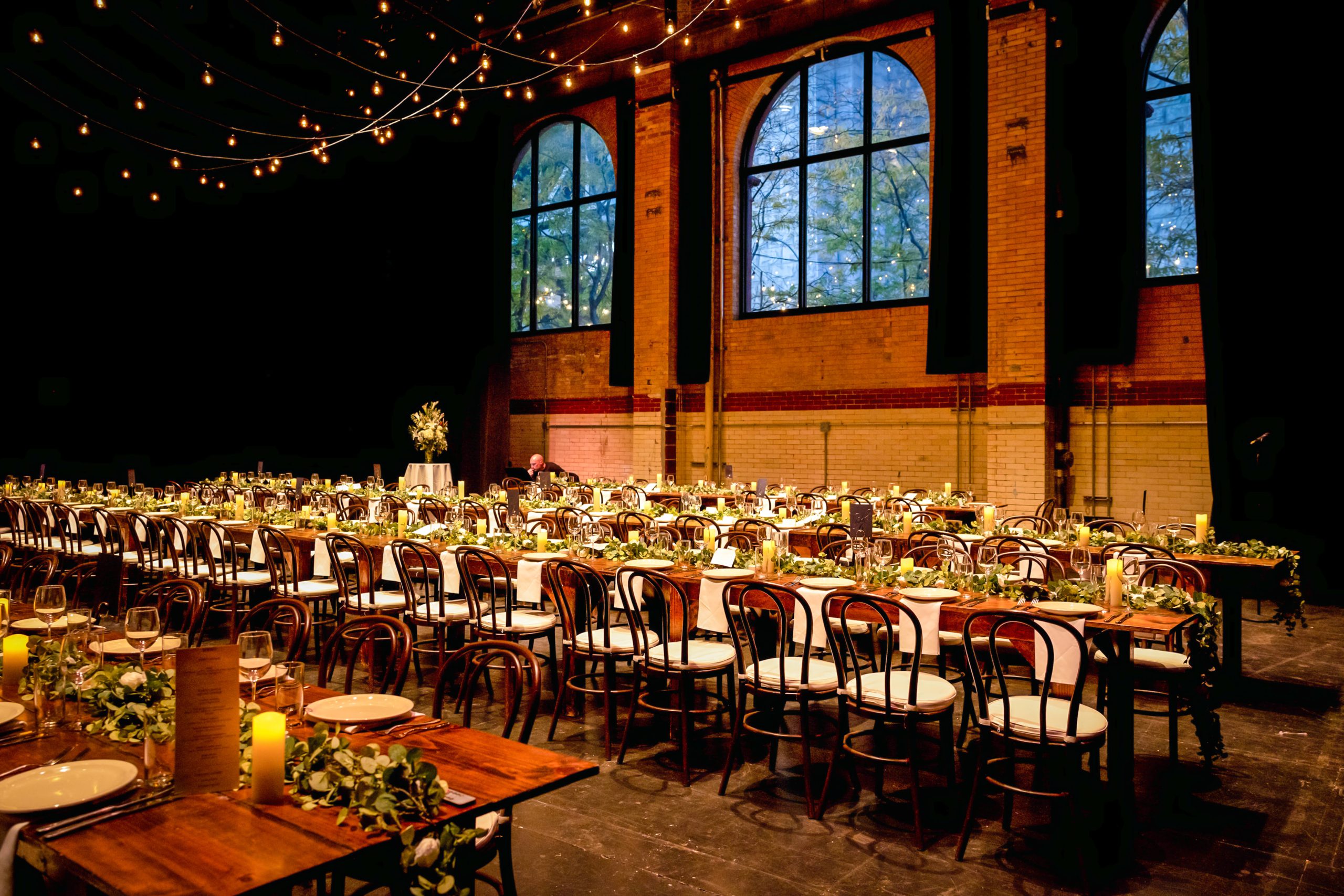 wedding feast table with chairs and floral design