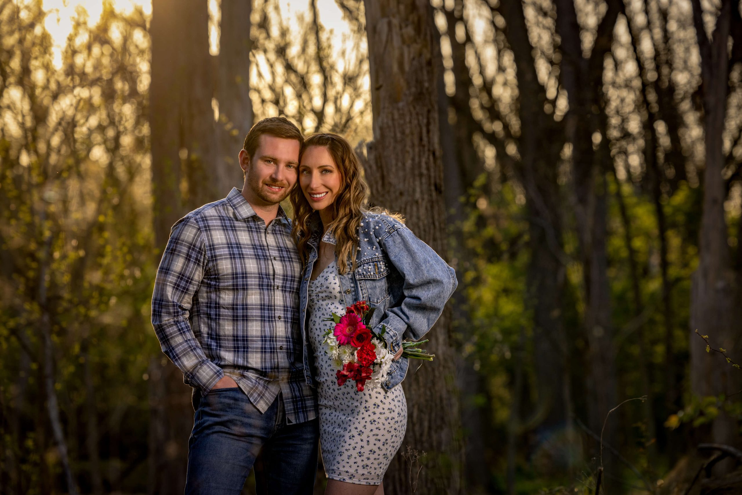 bald man with arm tattoos