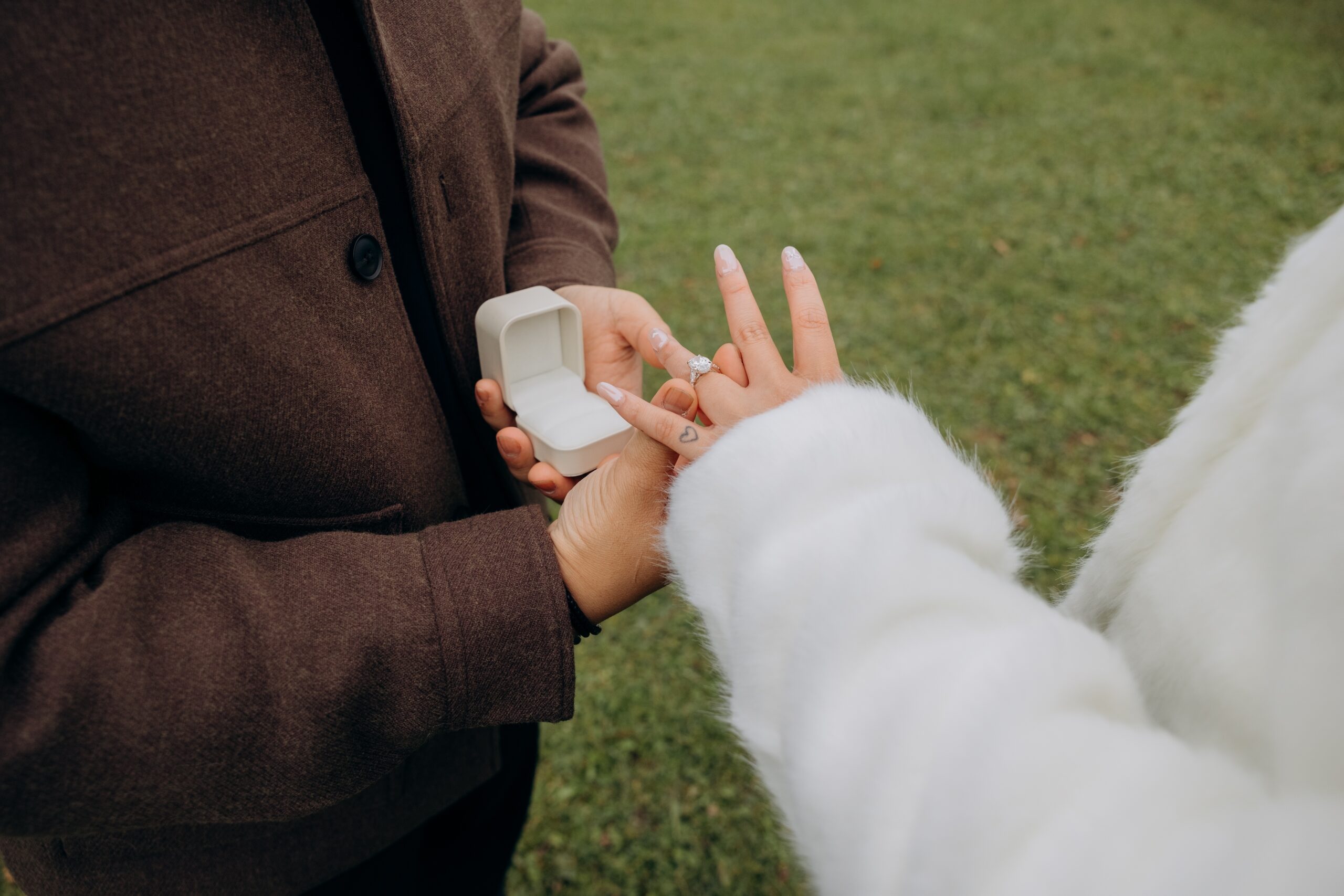 man kissing woman on cheek