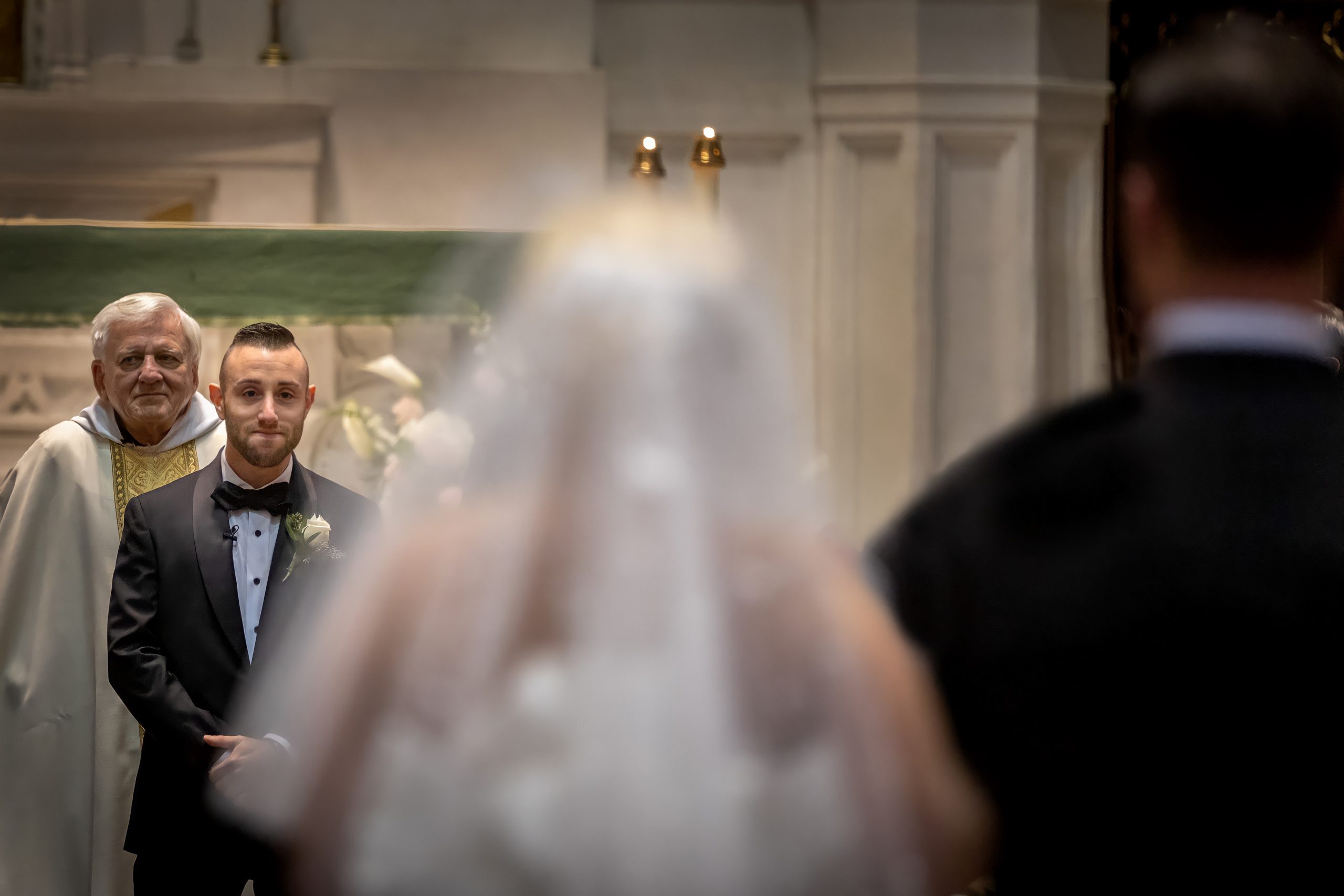 grooms cries as bride walks down the aisle