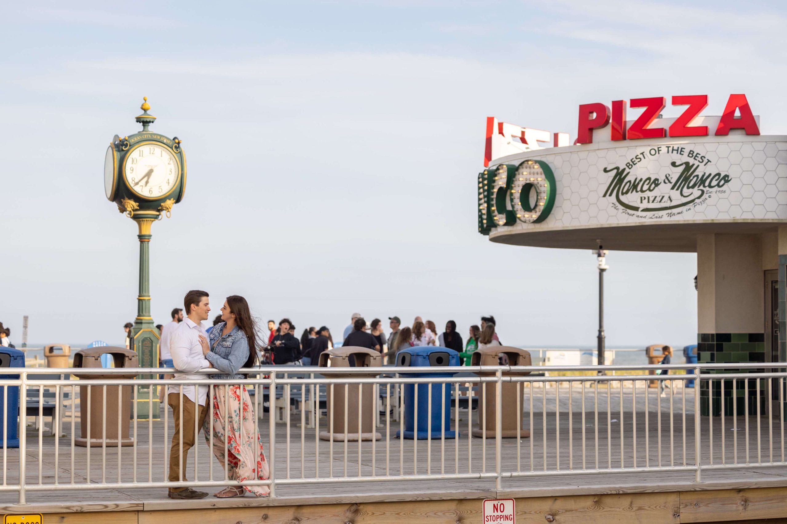 couple at boardwalk by manco and manco pizza