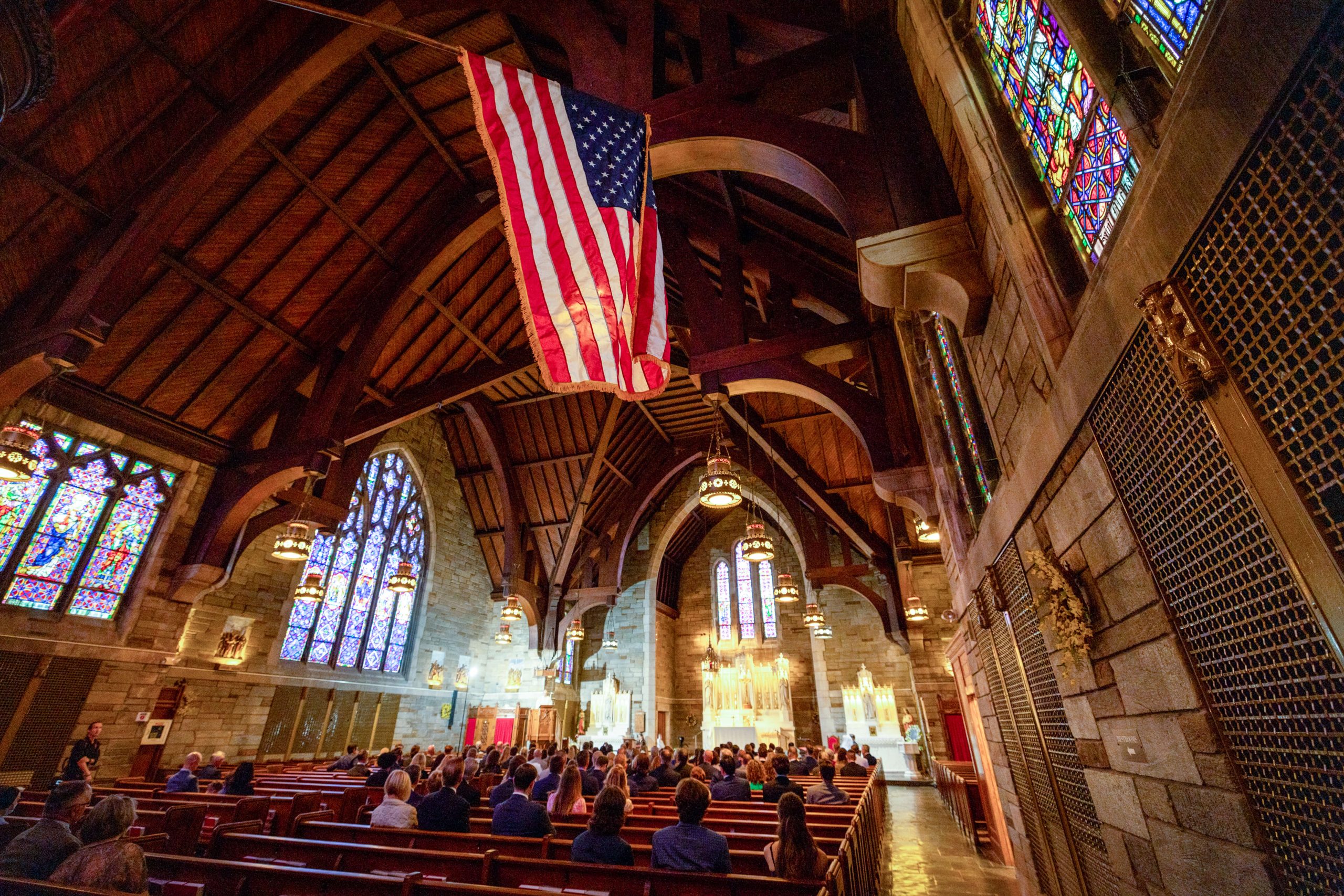 interior of catholic church with american flag