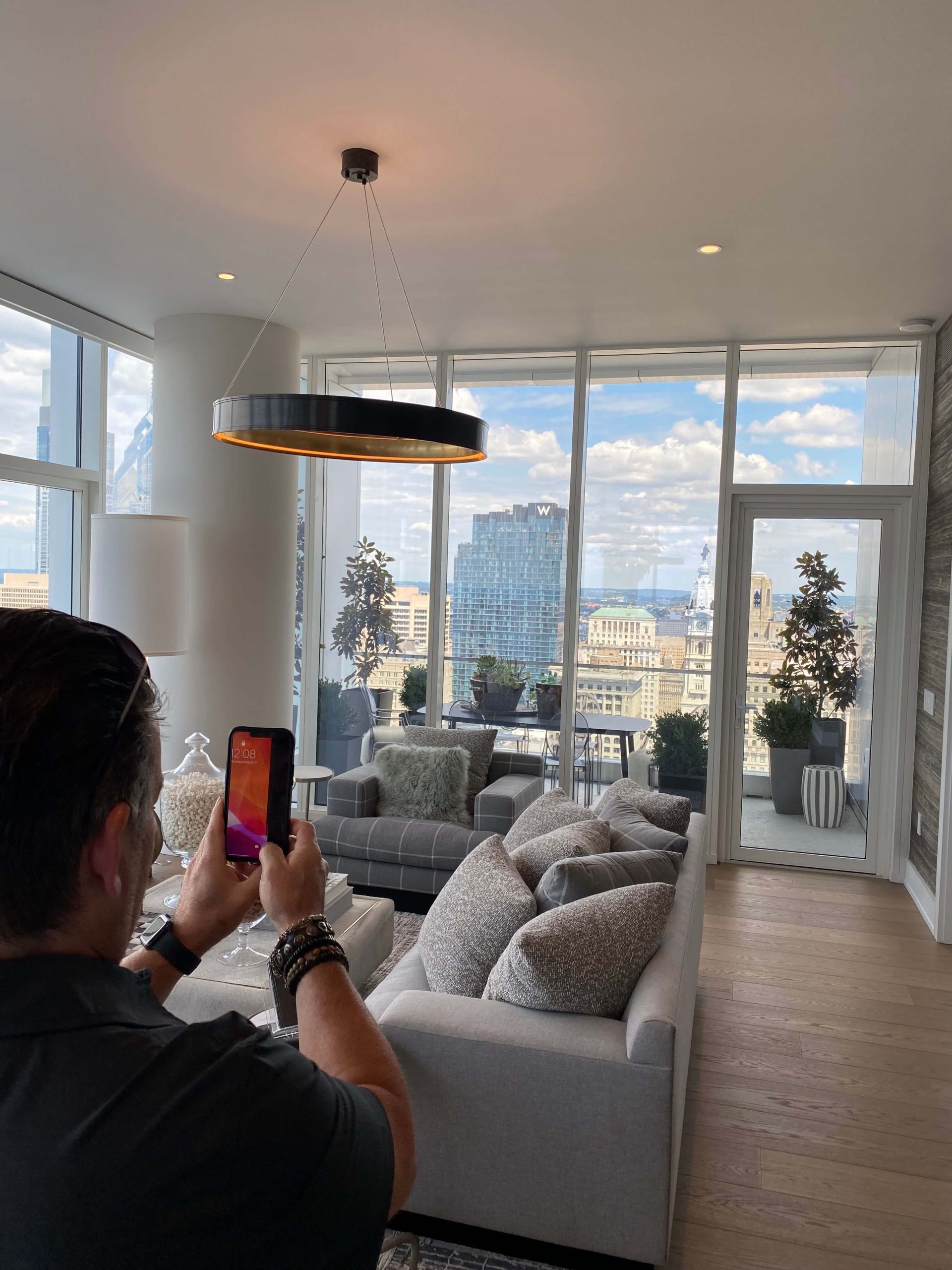 woman wearing floral kimono next to flower bouquet
