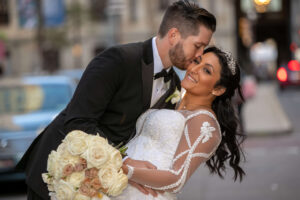 groom dips bride at broad street median in philly