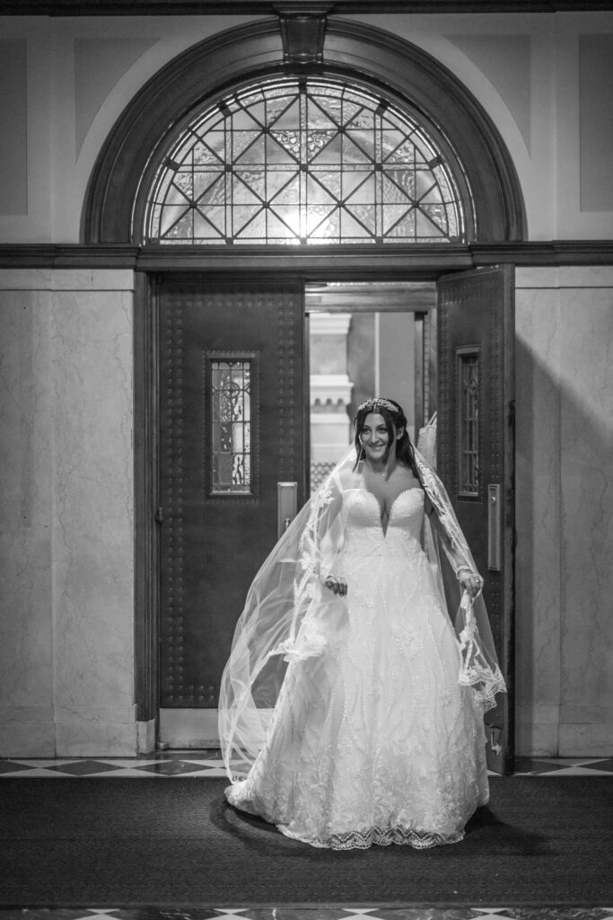 candid of bride at catholic wedding ceremony in philadelphia