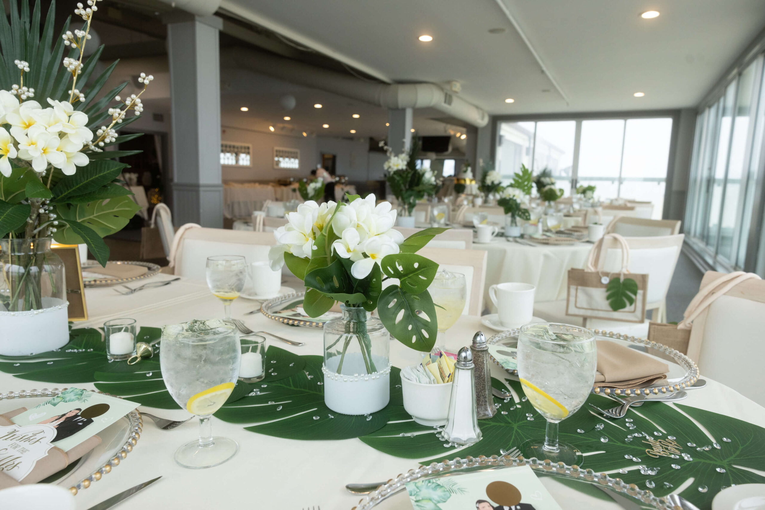 floral bouquet on guest table at a bridal shower at McLoone's Pier House