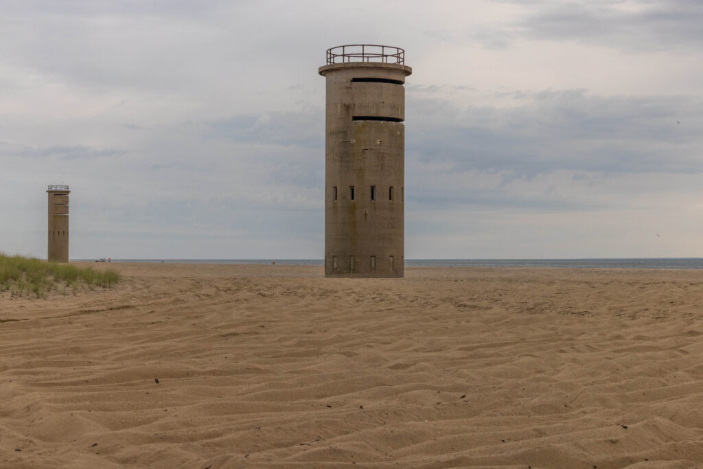 Historical observation towers from World War 2 in the sand at Delaware beach