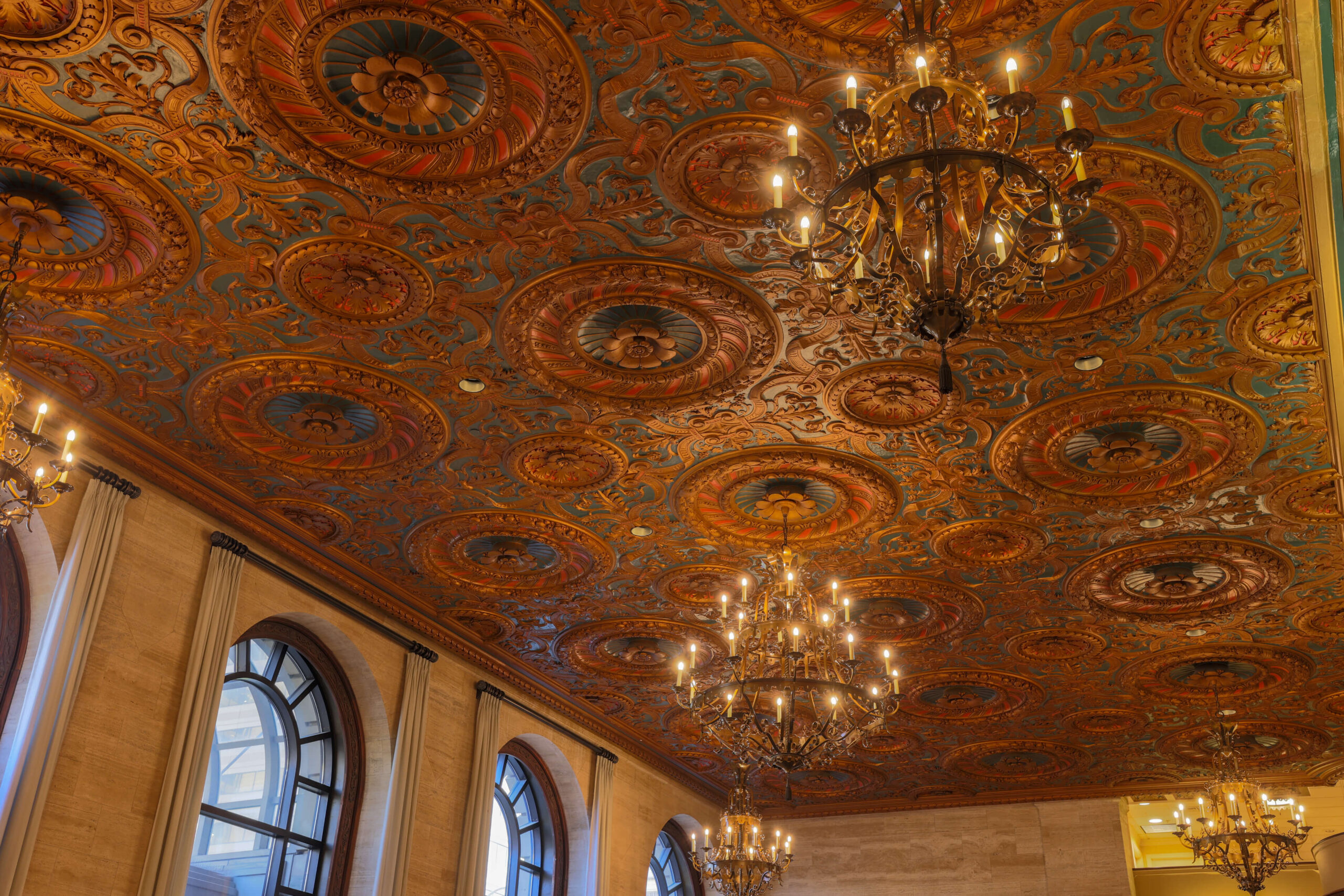 ceiling of hotel du pont in wilmington with elegant chandeliers