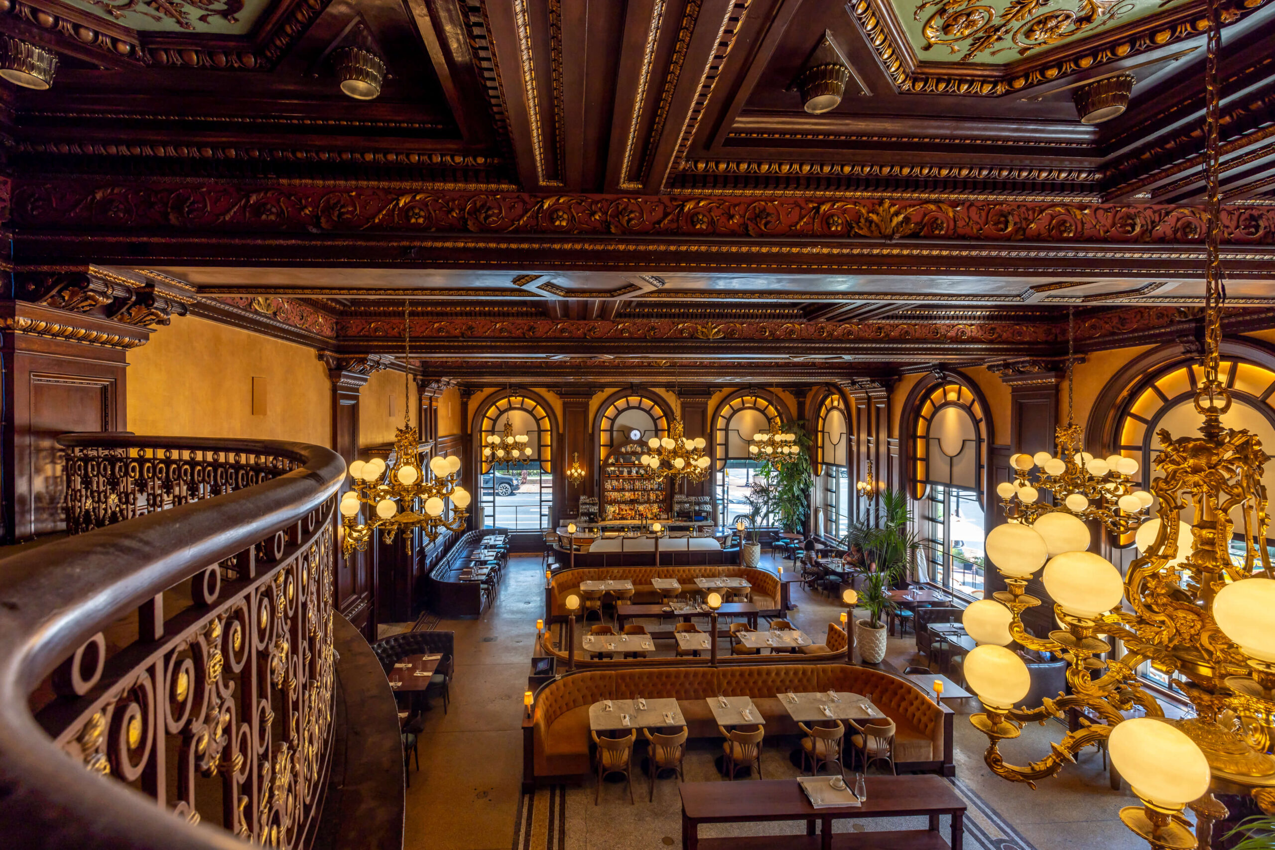 hotel du pont wedding reception ballroom with two grand chandeliers