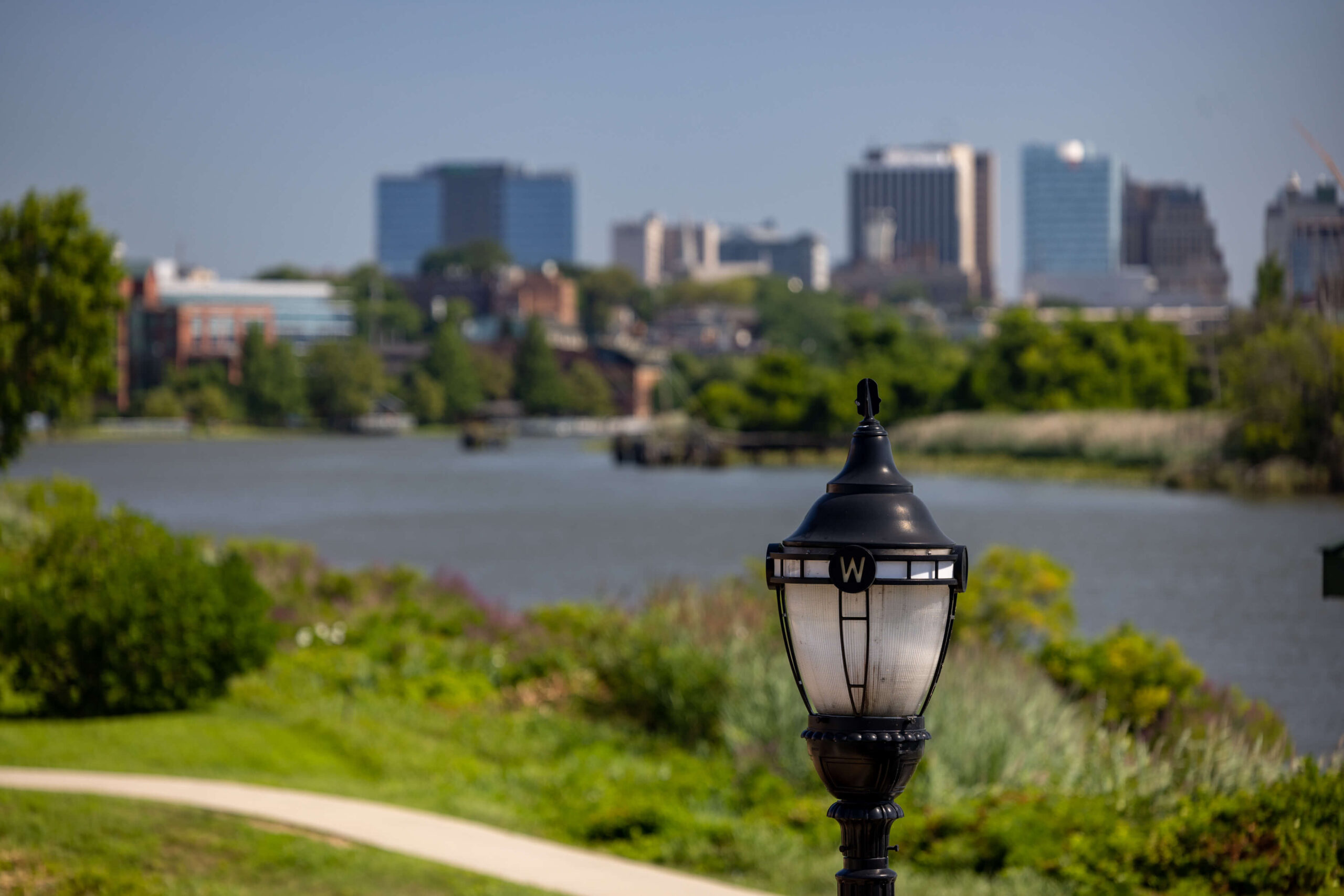 wilmington skyline during the day with a black street light in the foreground
