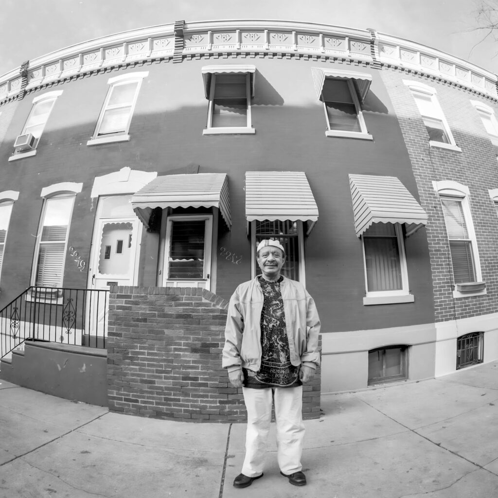 sherman hemsley standing in front of home in philadelphia