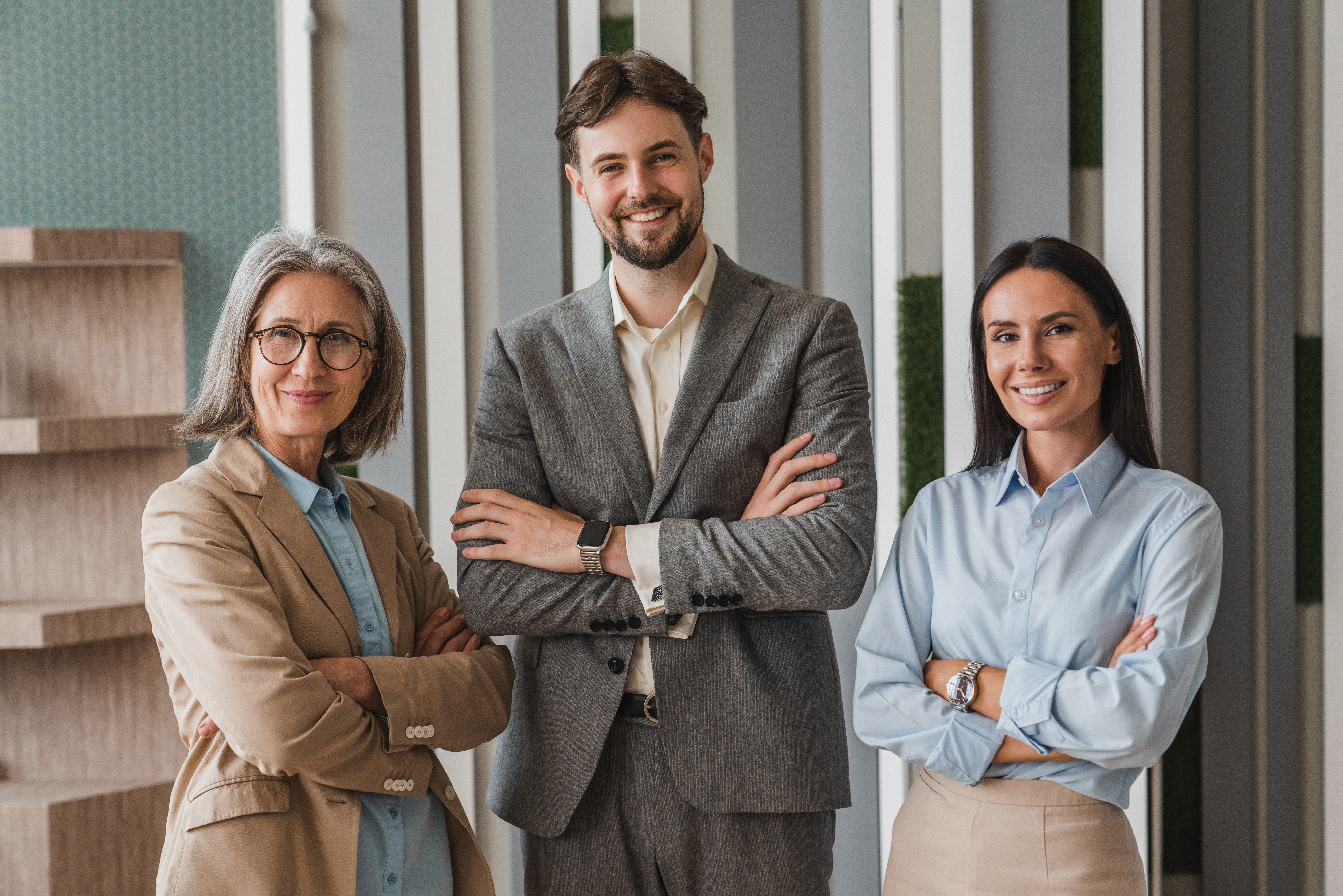 dynamic group portrait photo of six team members at black staircase