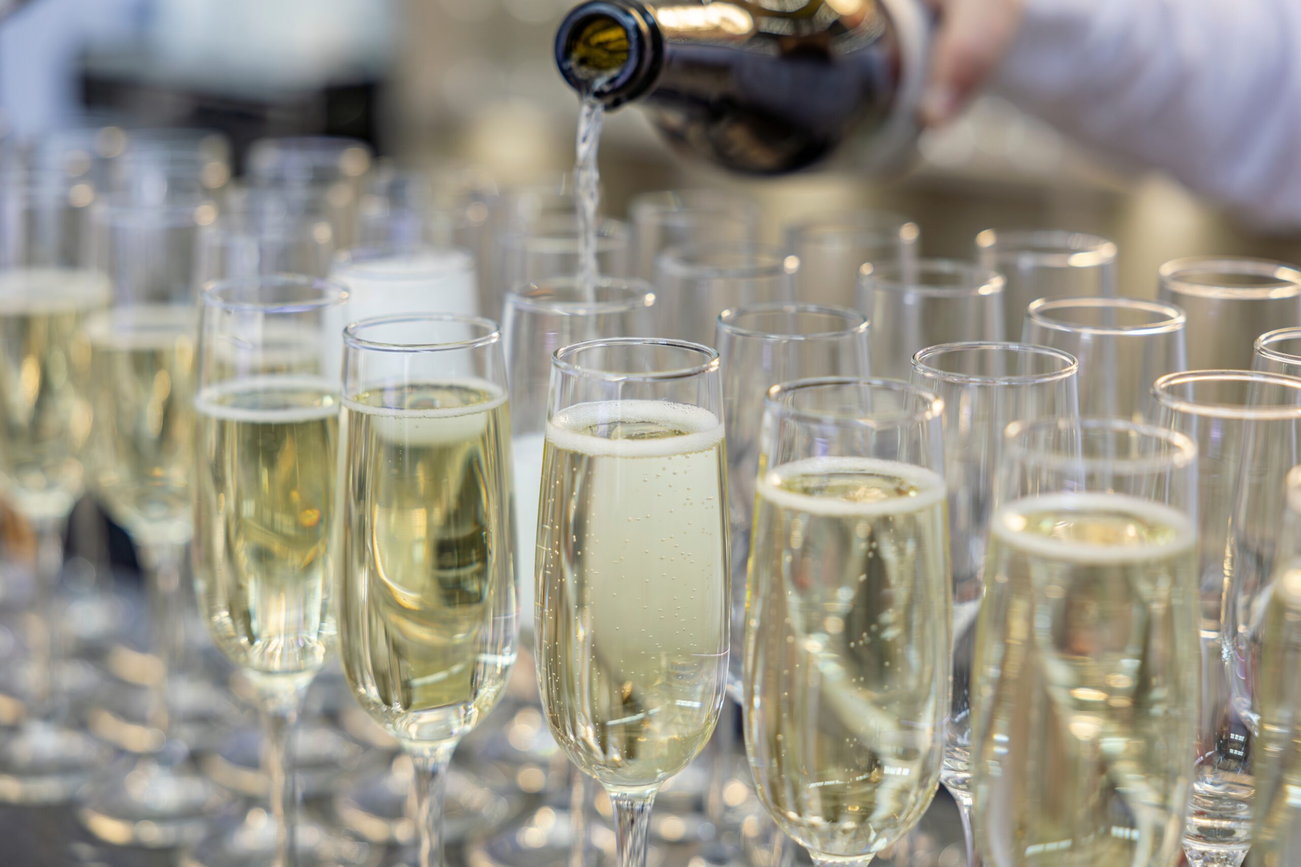 bride and groom posing together in the courtyard at the logan hotel in philly