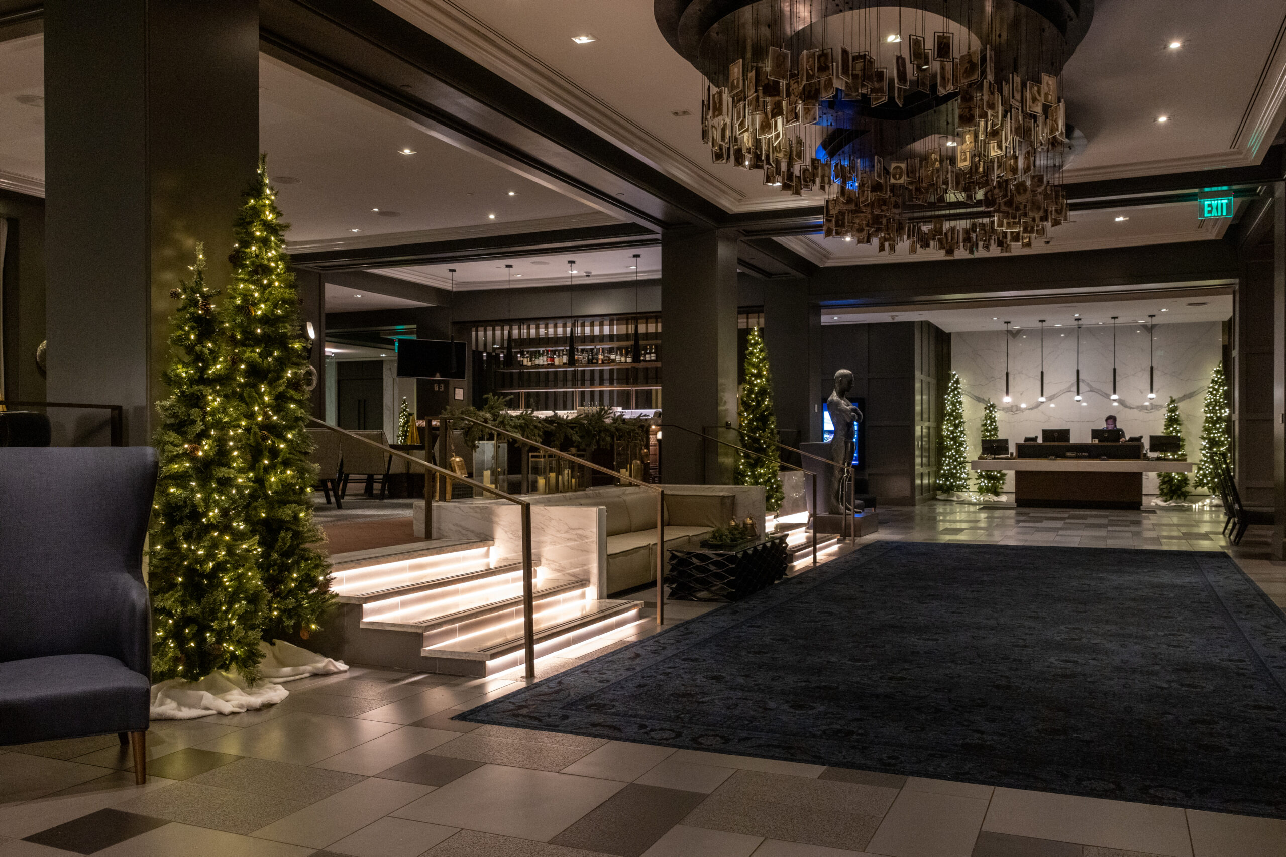 dynamic women in all black posing at the philadelphia museum of art during golden hour