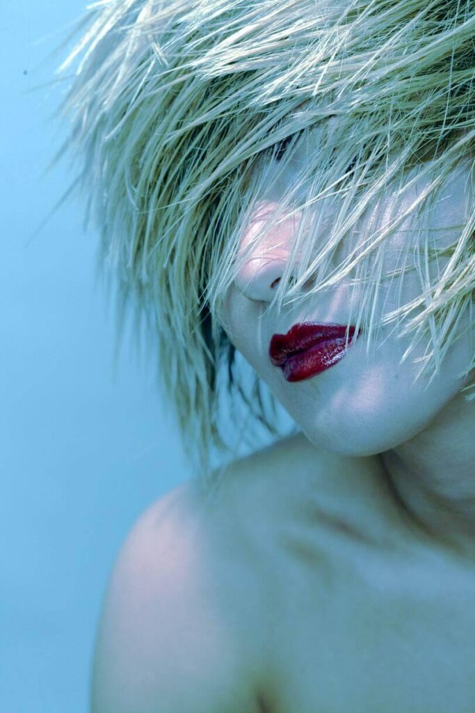 Conceptual photography philadelphia of a woman with hair covering her face